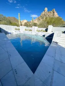 A pool with a view of the mountains